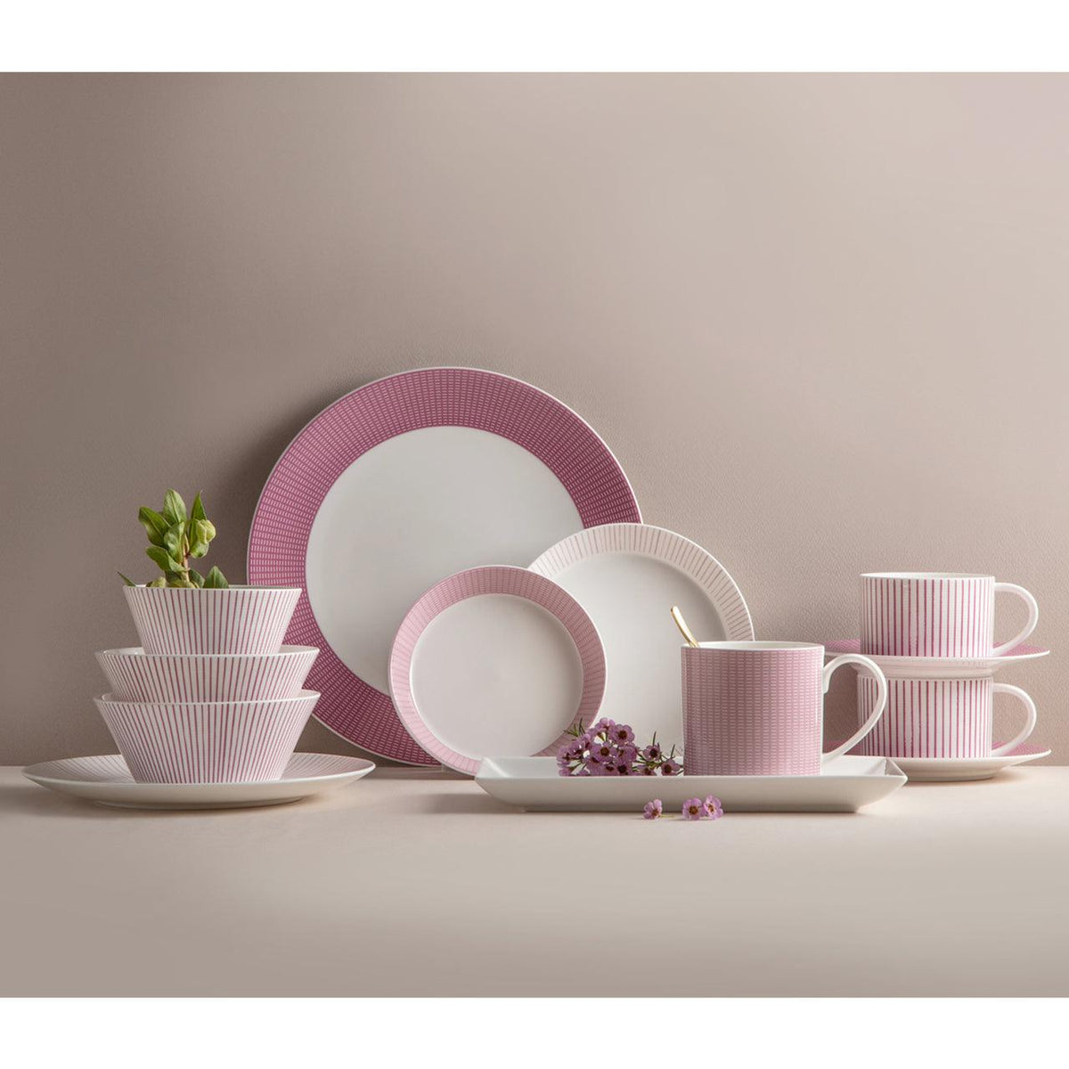 Cozy Pink dinnerware set arranged on a table